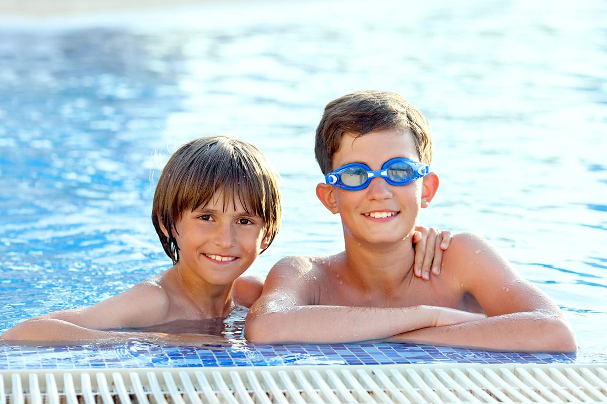 two boys swimming