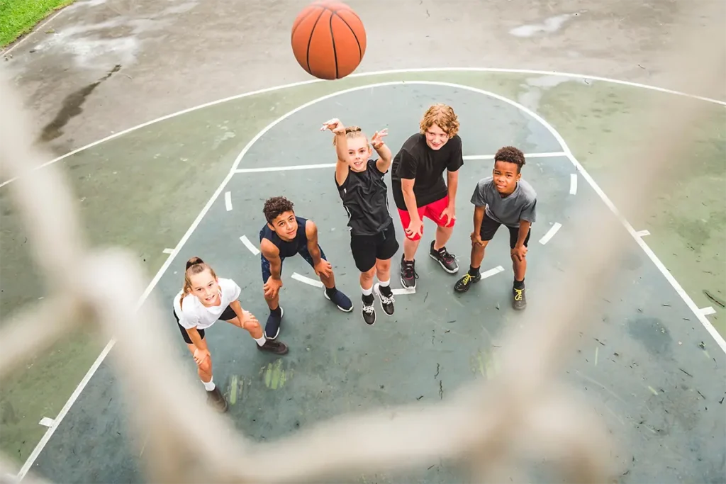 children playing basketball